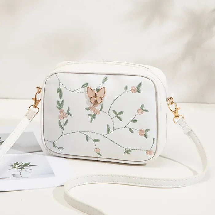Floral Embroidered Crossbody Bag with Butterfly Charm - HiGirlz